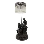 Bronzed resin table lamp with two figures and tasselled shade H75cm