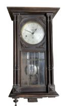 French - Westminster chiming 8-day three train wall clock in a stained oak case.c1920.