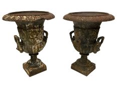 Pair of Victorian cast iron garden urns