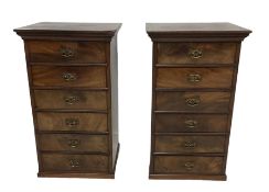 Pair of late Victorian and later figured mahogany pedestal chests