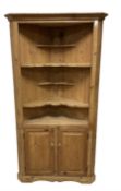 Waxed pine corner cupboard