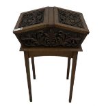 20th century carved oak workbox on stand