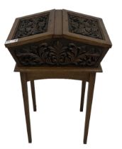 20th century carved oak workbox on stand