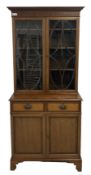 Early 20th century inlaid mahogany bookcase on cabinet