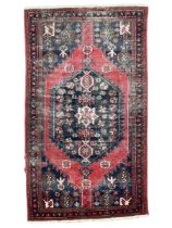 Persian Hamadan crimson ground rug