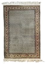 Indian woollen Arrak design ivory ground thick pile rug