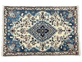 Persian Nain ivory ground thick pile rug