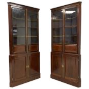 Matched pair of mahogany corner cabinets