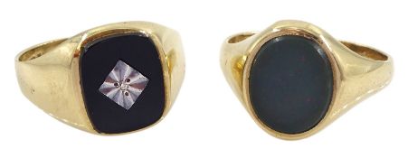 Gold bloodstone signet ring and a gold onyx and diamond signet ring