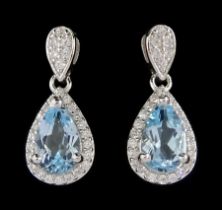 Pair of silver blue topaz and cubic zirconia pendant stud earrings