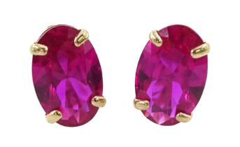 Pair of 9ct gold pink stone set earrings
