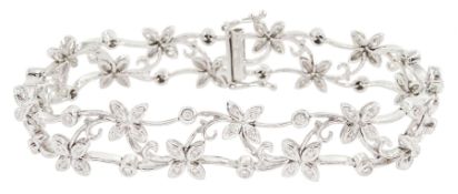 18ct white gold round brilliant cut diamond floral link bracelet