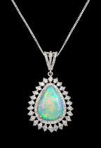 Silver pear cut opal and round brilliant cut diamond cluster pendant necklace