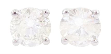 Pair of 18ct white gold round brilliant cut diamond stud earrings