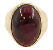 Gold single stone cabochon garnet ring