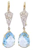 Pair of 18ct gold and silver blue topaz and diamond pendant earrings