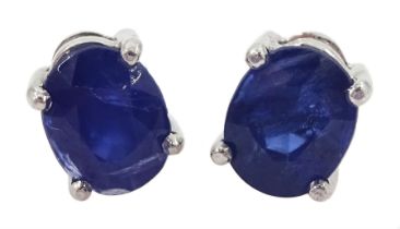 Pair of 18ct white gold single stone oval cut sapphire stud earrings
