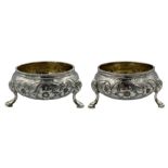 Pair of Victorian silver circular salts with gilded interiors