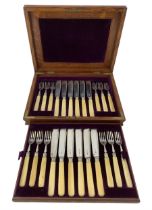 Set of twelve Edwardian silver bladed fish knives and forks with ivorine handles in oak case Sheffie