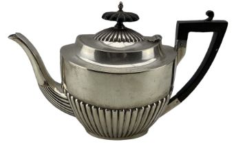 Edwardian silver oval teapot with half body reeded decoration