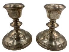 Pair of silver dressing table candlesticks with cushion knop stems and circular bases H12cm Birmingh