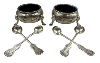 Pair of Victorian silver circular salts with bead edge decoration on shaped supports London 1864 Mak