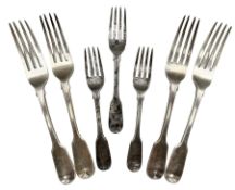 Three George IV silver fiddle pattern table forks engraved with a crest London 1824 Maker Richard Po
