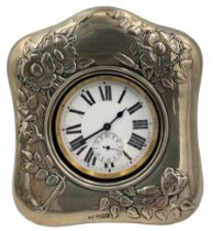 Swiss open face pocket watch with nickel case in an Edwardian silver mounted bedside case embossed w
