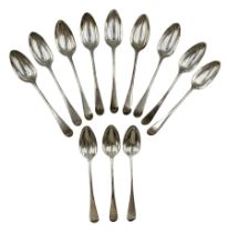 Set of twelve George III Celtic Point pattern silver table spoons engraved with a crescent shape cre