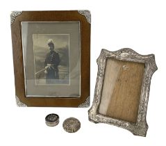 Leather upright photograph frame with silver corners