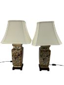 Pair of contemporary square section lamps on wooden plinths