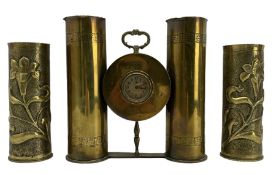 World War I Trench Art clock formed from two brass shell cases H28cm and a pair of Trench Art vases