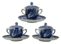 Set of three 18th/ early 19th century blue transfer printed chocolate cups and saucers with trembleu