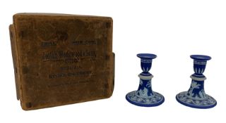 Pair of early 20th century Wedgwood dark blue Jasperware candlesticks
