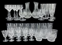Part suite of Stuart Glengarry pattern crystal drinking glasses comprising two carafes
