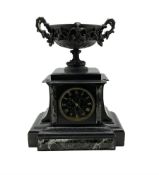 French - late 19th century 8-day Belgium slate mantle clock with a break front case and variegated