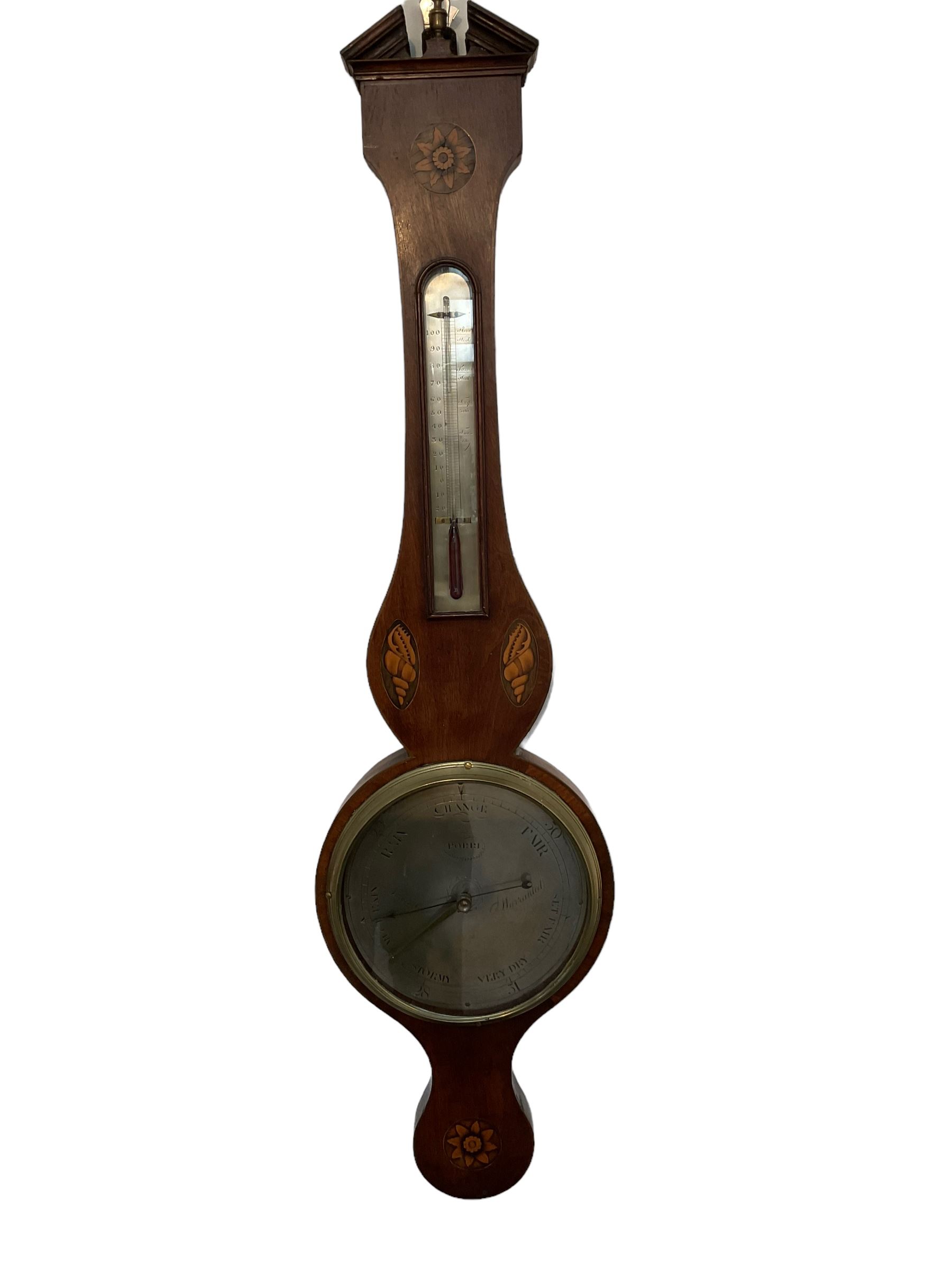 Early 19th century - Inlaid mahogany Sheraton mercury barometer with a silvered register and spirit