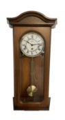 Hermle - German 20th century wooden wall clock in a plain case with a fully glazed case door