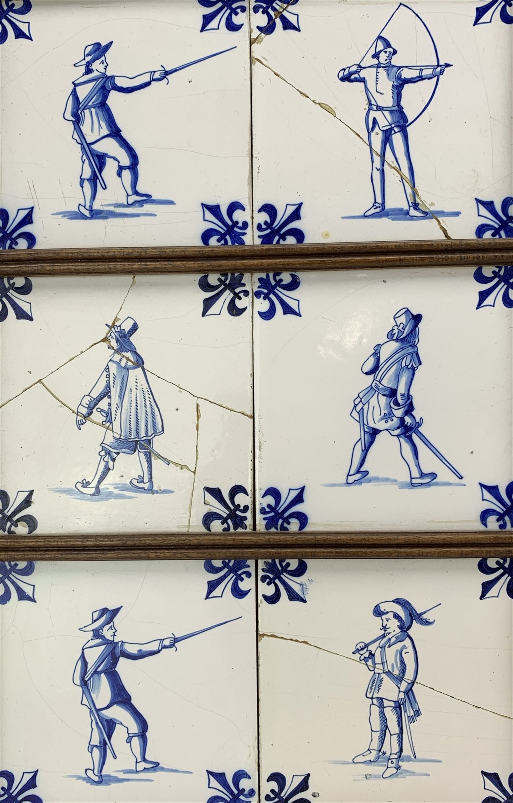 Set of nine 18th century English Delft tiles painted with Oriental figures with birds to the corners - Image 3 of 3