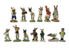 Group of thirteen Royal Doulton Bunnykins figures