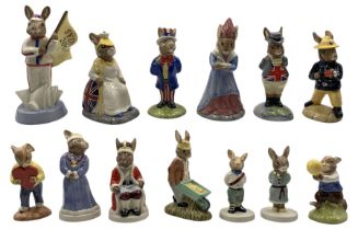 Group of thirteen Royal Doulton Bunnykins figures