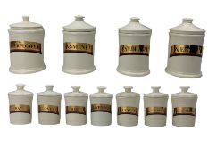 Eleven pottery spice jars