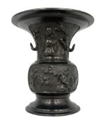 Chinese bronze gu vase decorated with a raised pattern of flowering branches
