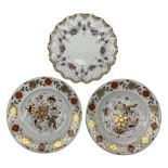 Three Royal Crown Derby plates comprising a pair of Asian Rose dinner plates no. 8687 D27cm and a Ro