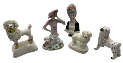 Group of 19th century Staffordshire poodle dog models
