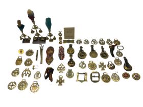 Various horse brasses including inverted crescents