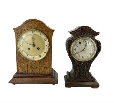 Two early 20th century wooden cased 8-day mantel clocks - one with an oak case