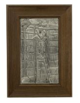 Relief moulded pewter picture depicting 'The Bookworm' after Carl Spitzweg