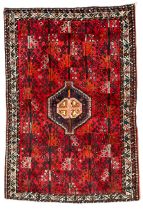 Persian crimson ground rug