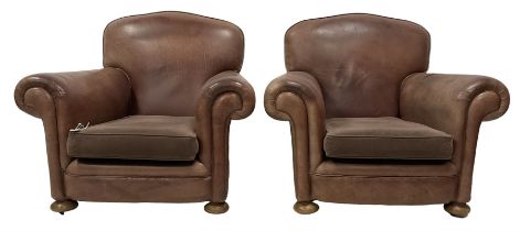Pair of early 20th century club armchairs
